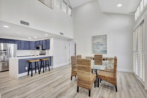 Dining room, Interior, Kitchen, Recessed Lighting, Stainless Steel Appliances, Wood Texture Flooring