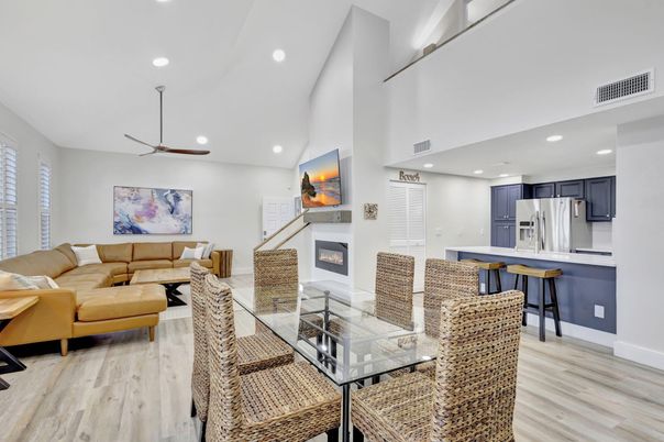 Dining room, Fireplace, Interior, Kitchen, Living room, Recessed Lighting, Stainless Steel Appliances, Wood Texture Flooring