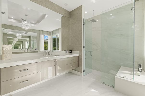 Bathroom, Dual Sink Vanities, Glass Shower, Interior, Marble, Marble Walls, Recessed Lighting