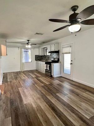 Empty room, Interior, Kitchen, Stainless Steel Appliances, Wood Texture Flooring