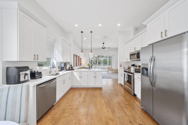 Interior, Kitchen, Pendant Lights, Recessed Lighting, Stainless Steel Appliances, Wood Texture Flooring