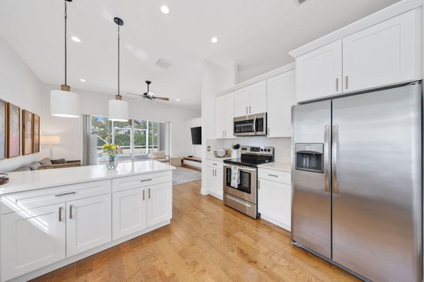 Interior, Kitchen, Pendant Lights, Recessed Lighting, Stainless Steel Appliances, Wood Texture Flooring