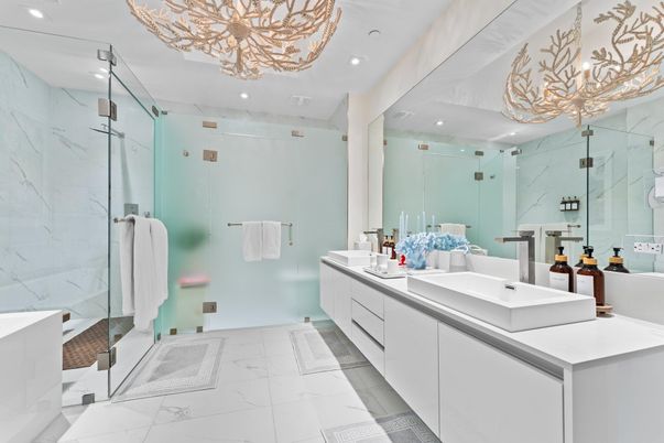Bathroom, Dual Sink Vanities, Glass Shower, Interior, Marble, Marble Walls, Recessed Lighting
