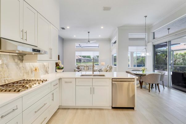 Dining room, Interior, Kitchen, Pendant Lights, Recessed Lighting, Stainless Steel Appliances, Wood Texture Flooring