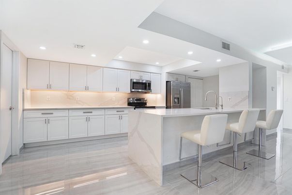Interior, Kitchen, Marble, Marble Walls, Recessed Lighting, Stainless Steel Appliances