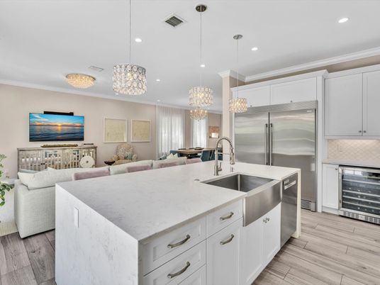 Chandelier, Interior, Kitchen, Living room, Pendant Lights, Recessed Lighting, Stainless Steel Appliances, Wood Texture Flooring
