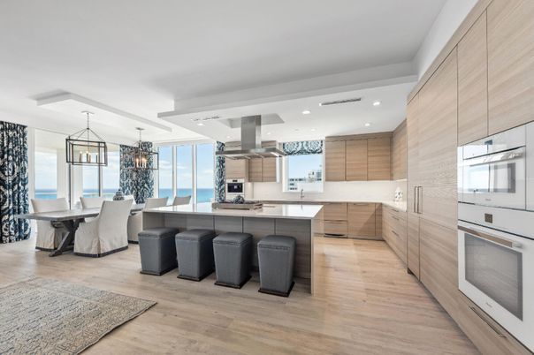 Chandelier, Dining room, Interior, Kitchen, Pendant Lights, Recessed Lighting, Stainless Steel Appliances, Water, Wood Texture Flooring