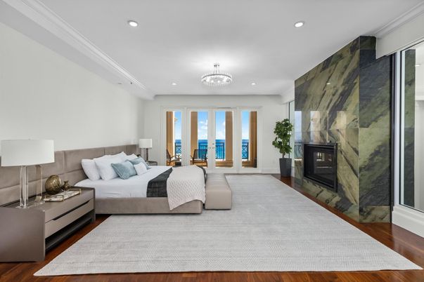 Bedroom, Fireplace, Interior, Recessed Lighting, Water, Wood Texture Flooring