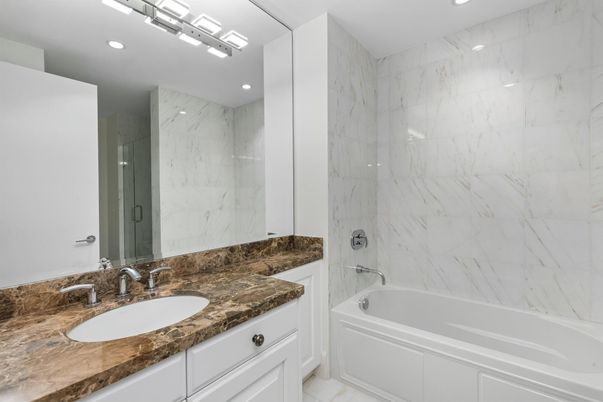 Bathroom, Dual Sink Vanities, Interior, Marble Walls, Recessed Lighting
