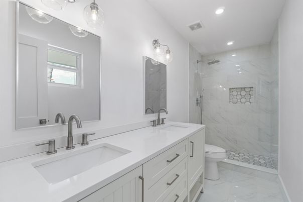 Bathroom, Dual Sink Vanities, Glass Shower, Interior, Marble, Marble Walls, Recessed Lighting