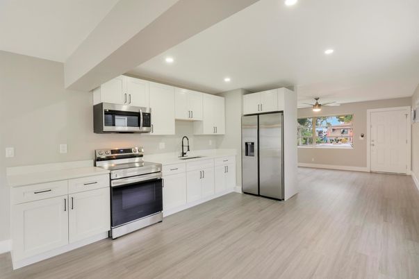 Interior, Kitchen, Recessed Lighting, Stainless Steel Appliances, Wood Texture Flooring