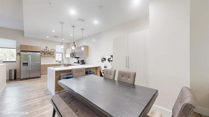 Dining room, Interior, Kitchen, Pendant Lights, Recessed Lighting, Stainless Steel Appliances, Wood Texture Flooring
