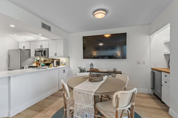 Dining room, Interior, Kitchen, Recessed Lighting, Stainless Steel Appliances, Wood Texture Flooring