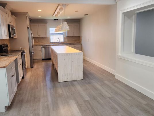 Interior, Kitchen, Pendant Lights, Recessed Lighting, Stainless Steel Appliances, Wood Texture Flooring