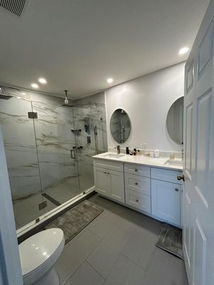 Bathroom, Dual Sink Vanities, Glass Shower, Interior, Marble Walls, Recessed Lighting