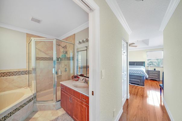 Bathroom, Dual Sink Vanities, Glass Shower, Interior, Wood Texture Flooring