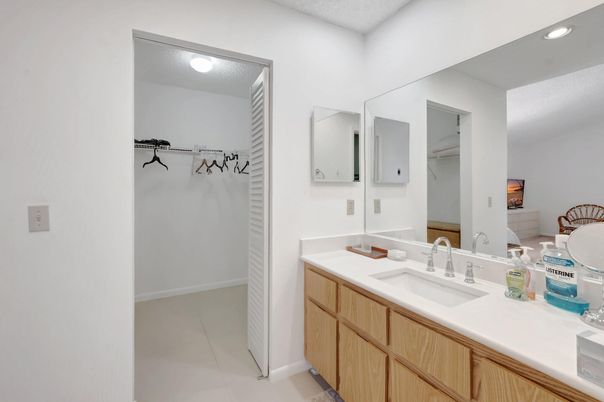Bathroom, Dual Sink Vanities, Interior, Recessed Lighting, Walk-in Closets