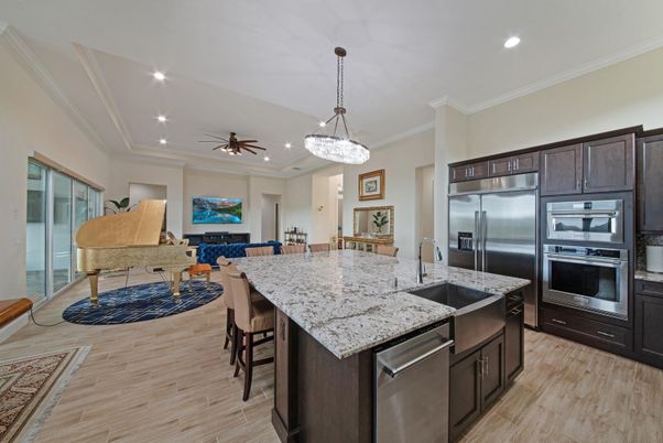 Dining room, Interior, Kitchen, Living room, Pendant Lights, Recessed Lighting, Stainless Steel Appliances, Wood Texture Flooring