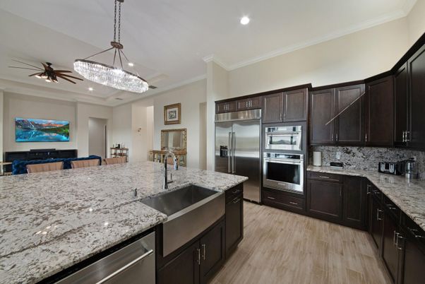 Chandelier, Interior, Kitchen, Pendant Lights, Recessed Lighting, Stainless Steel Appliances, Wood Texture Flooring