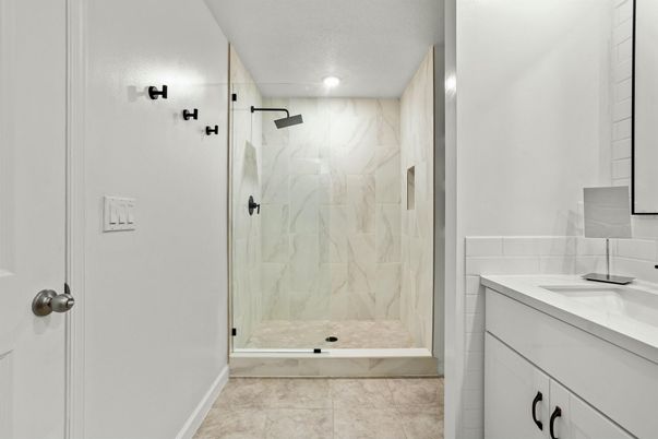 Bathroom, Glass Shower, Interior, Marble Walls, Recessed Lighting