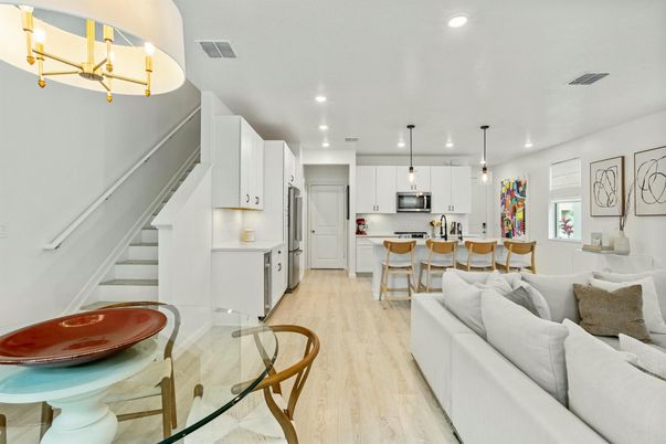Dining room, Interior, Kitchen, Living room, Pendant Lights, Recessed Lighting, Stainless Steel Appliances, Wood Texture Flooring