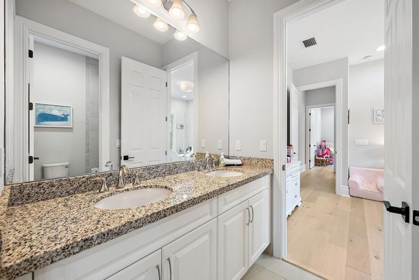 Bathroom, Dual Sink Vanities, Interior, Recessed Lighting, Wood Texture Flooring