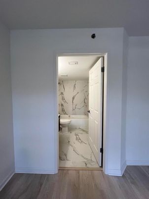 Bathroom, Interior, Marble, Marble Walls, Recessed Lighting, Wood Texture Flooring