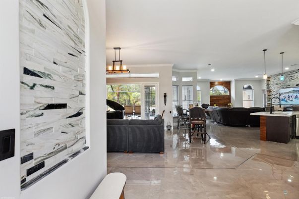 Fireplace, Interior, Living room, Marble Walls, Pendant Lights, Piano, Recessed Lighting
