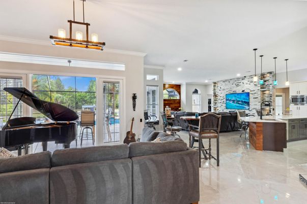 Dining room, Interior, Kitchen, Living room, Pendant Lights, Piano, Recessed Lighting, Stone Walls