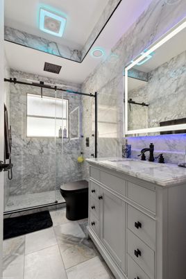 Bathroom, Dual Sink Vanities, Free Standing Baths, Glass Shower, Interior, Marble, Marble Walls, Recessed Lighting
