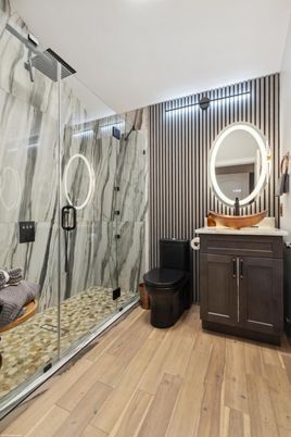 Bathroom, Glass Shower, Interior, Marble Walls, Wood Texture Flooring