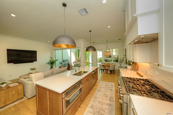 Dining room, Interior, Kitchen, Living room, Pendant Lights, Recessed Lighting, Stainless Steel Appliances, Wood Texture Flooring
