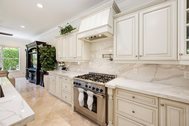 Interior, Kitchen, Marble Walls, Recessed Lighting, Stainless Steel Appliances