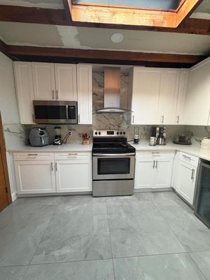 Interior, Kitchen, Marble Walls, Stainless Steel Appliances