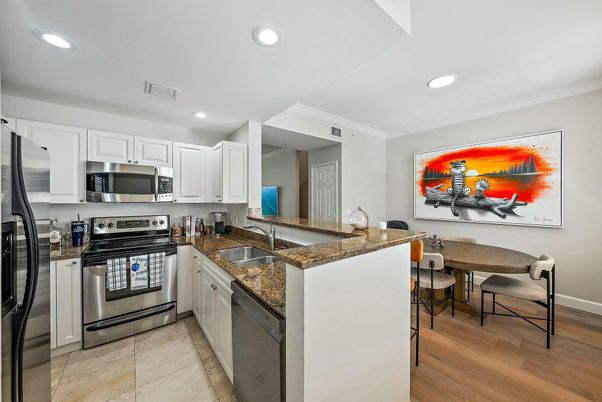 Dining room, Interior, Kitchen, Recessed Lighting, Stainless Steel Appliances, Wood Texture Flooring
