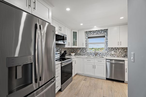 Interior, Kitchen, Recessed Lighting, Stainless Steel Appliances, Wood Texture Flooring