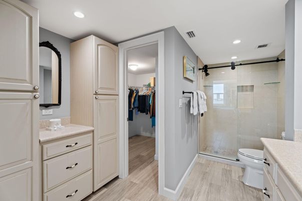 Bathroom, Glass Shower, Interior, Recessed Lighting, Walk-in Closets, Wood Texture Flooring