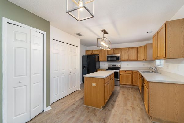 Interior, Kitchen, Pendant Lights, Stainless Steel Appliances, Wood Texture Flooring