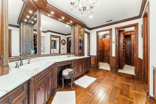 Bathroom, Chandelier, Dual Sink Vanities, Interior, Recessed Lighting, Wood Texture Flooring