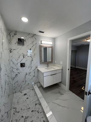Bathroom, Dual Sink Vanities, Interior, Marble, Marble Walls, Recessed Lighting