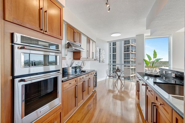 Dining room, Interior, Kitchen, Recessed Lighting, Stainless Steel Appliances, Wood Texture Flooring