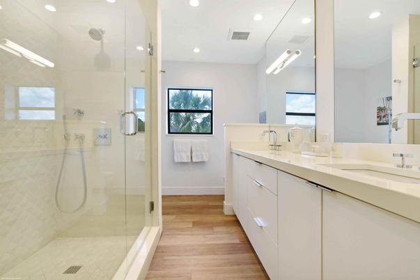 Bathroom, Dual Sink Vanities, Glass Shower, Interior, Recessed Lighting, Wood Texture Flooring