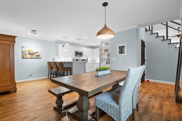 Dining room, Interior, Kitchen, Pendant Lights, Recessed Lighting, Stainless Steel Appliances, Wood Texture Flooring