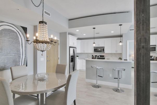 Dining room, Interior, Kitchen, Pendant Lights, Recessed Lighting, Stainless Steel Appliances, Wood Texture Flooring