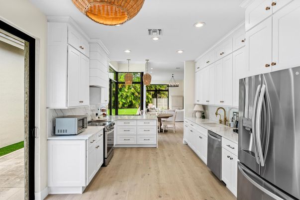 Dining room, Interior, Kitchen, Pendant Lights, Recessed Lighting, Stainless Steel Appliances, Wood Texture Flooring