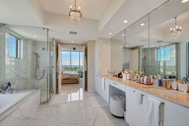 Bathroom, Bedroom, Chandelier, Dual Sink Vanities, Glass Shower, Interior, Marble, Marble Walls, Pendant Lights, Recessed Lighting