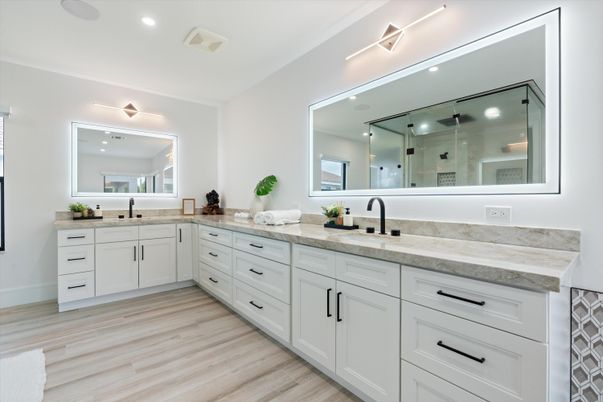 Bathroom, Dual Sink Vanities, Glass Shower, Interior, Recessed Lighting, Wood Texture Flooring