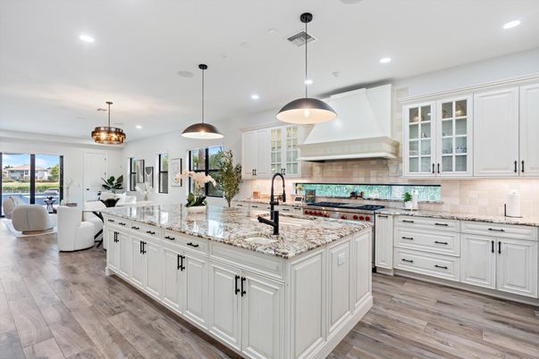Dining room, Interior, Kitchen, Living room, Pendant Lights, Recessed Lighting, Stainless Steel Appliances, Wood Texture Flooring