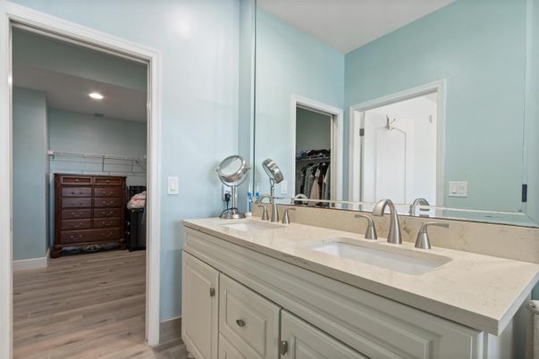 Bathroom, Dual Sink Vanities, Interior, Recessed Lighting, Walk-in Closets, Wood Texture Flooring