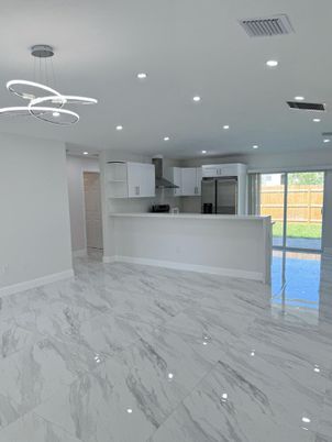 Interior, Kitchen, Marble, Pendant Lights, Recessed Lighting, Stainless Steel Appliances